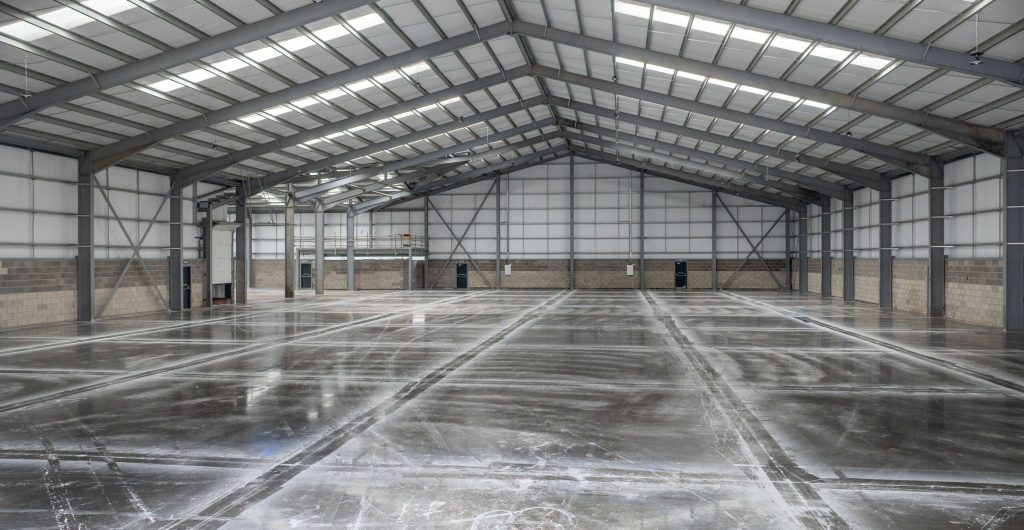 Power floated internal concrete floor in a completed warehouse unit